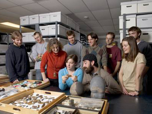 Dr. Radovanovic and students working with collections in the archive.