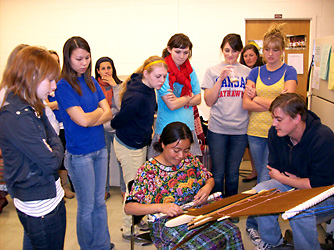 Students learning cultural traditions in the classroom